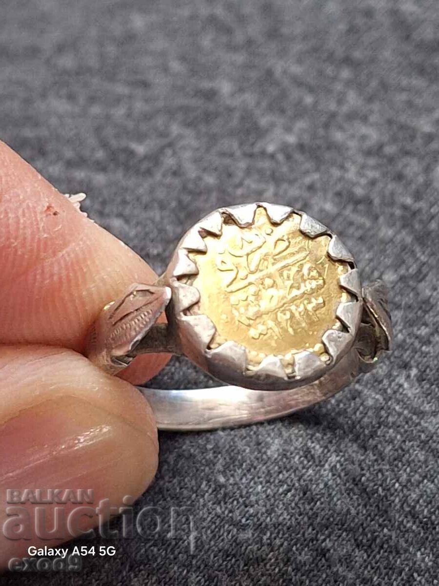 Auction Antique silver ring with a gold coin Auction Antique silver ring with a gold coin