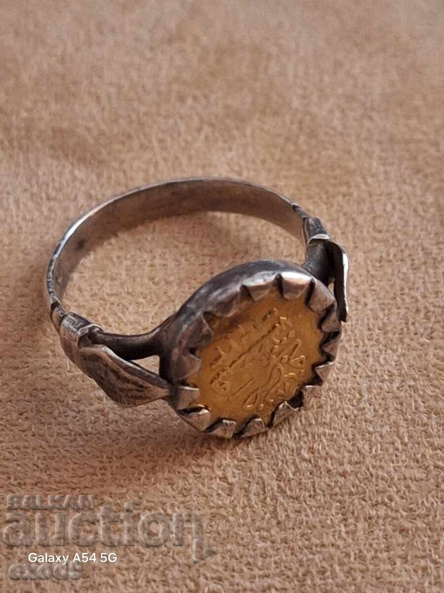 Delivery of Antique silver ring with a gold coin Delivery of Antique silver ring with a gold coin