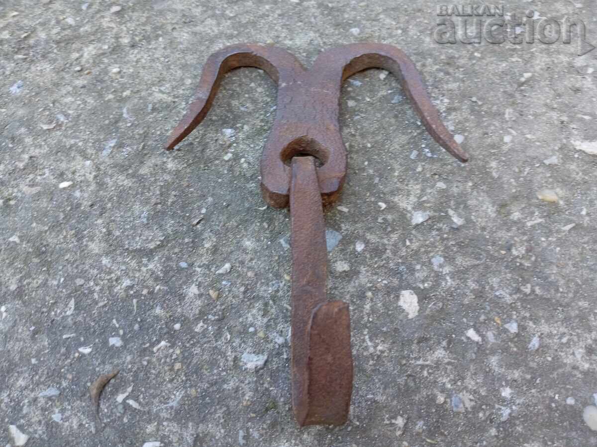 Delivery of Antique forged hook, claw, anchor
