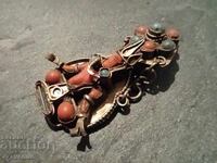 Cercei clip coral bronz, probabil Tibet 3.11..25
