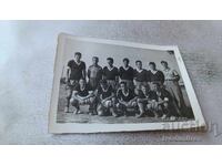 Photo Football team with its coach