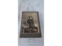 Fotografie Fetiță pe bancă împletită Carton