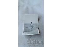 Φωτογραφία Νεαρό κορίτσι στην προβλήτα