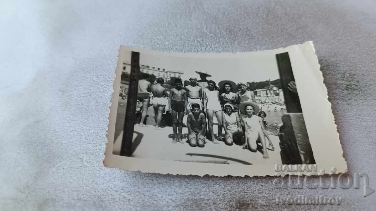 Photo of Boys and Girls with Retro Swimsuits on the Pier