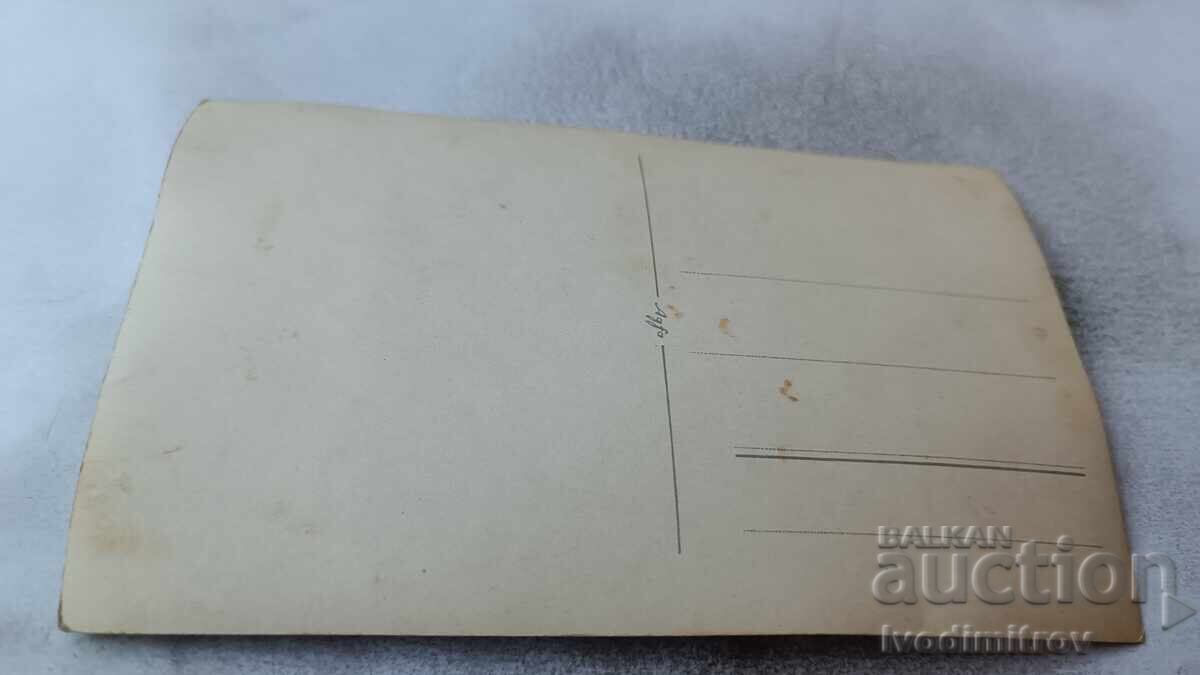 Photo Sofia Men and woman in front of a single-family house with price 4.45 BGN | € 2.28