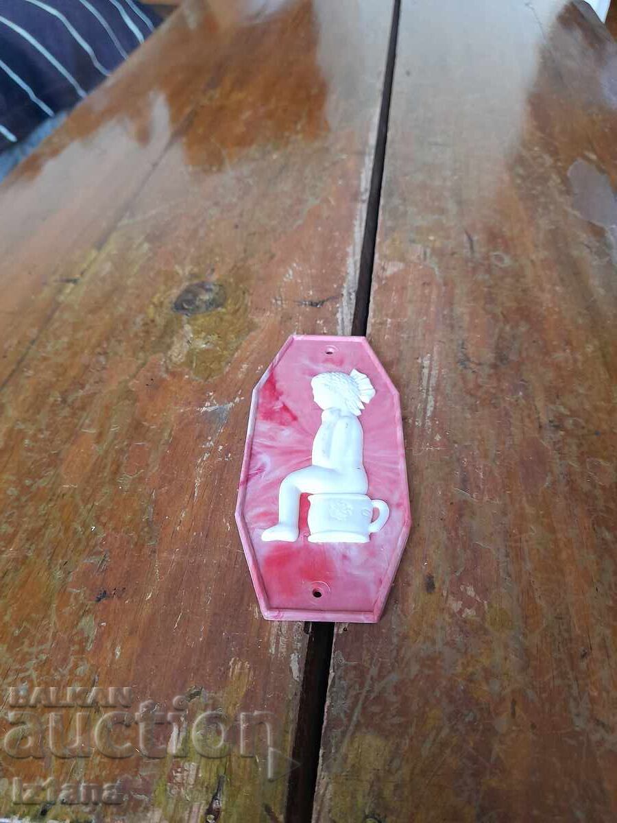 Old sign, toilet sign