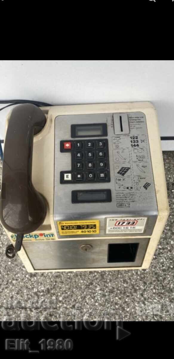 Telefon public cu monede