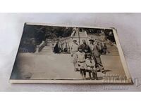 Varna C-ka Man, women, and children in front of the stairs in the Sea Garden