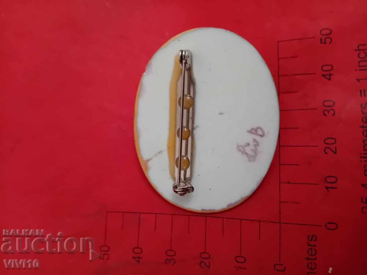 Auction  Antique author's brooch, porcelain