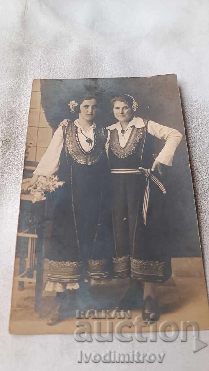 Photo of Two Women in Folk Costumes Photo of Two Women in Folk Costumes