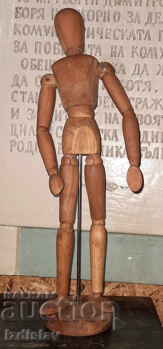 Delivery of Wooden doll human body model