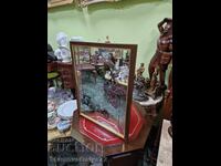 O oglindă publicitară antică grozavă