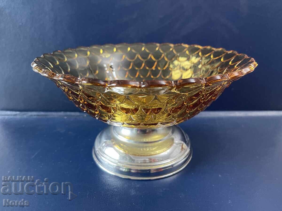 Glass fruit bowl on a metal stand Glass fruit bowl on a metal stand