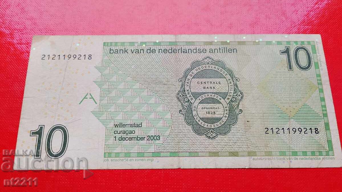 Παράδοση Τραπεζογραμμάτιο 10 γκίλντερ Ολλανδικών Αντιλλών Παράδοση Τραπεζογραμμάτιο 10 γκίλντερ Ολλανδικών Αντιλλών
