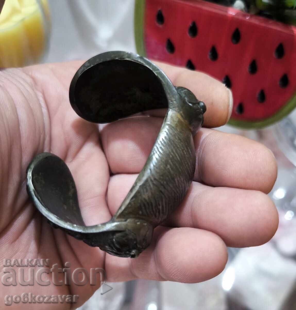 Auction  Revival-era baked clay bracelet, slingshot, ornament, jewelry!