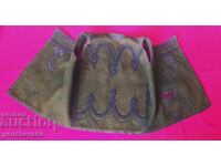 Authentic men's vest with braid trim