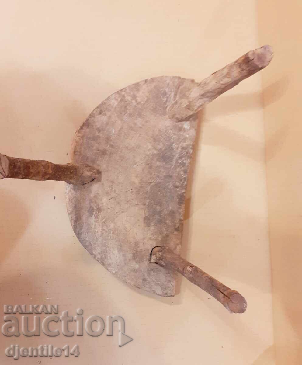 Auction  Three-legged wooden stool