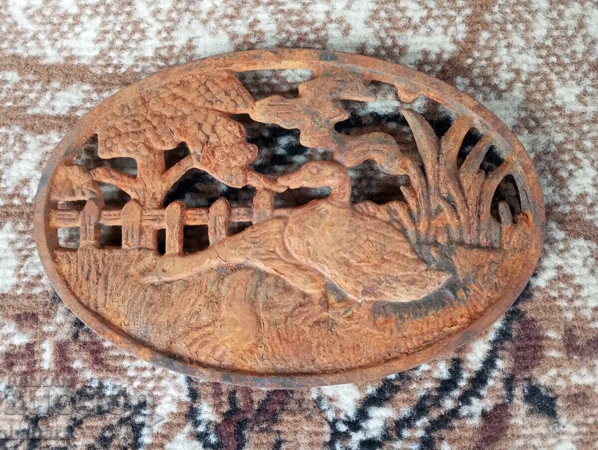 Antique metal iron rest