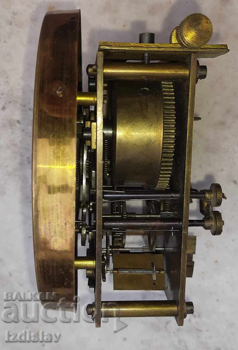 Delivery of Rare mechanism with a clock face for a wall clock Delivery of Rare mechanism with a clock face for a wall clock