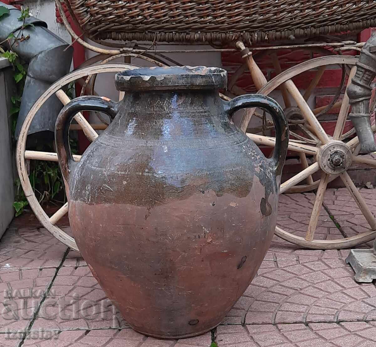Auction  Large ethnographic glazed jug, mid-19th century