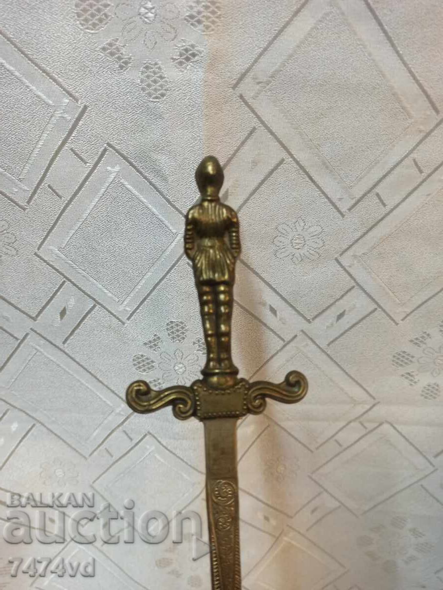 Delivery of KAMA, Letter Opener with a Figure at the Top