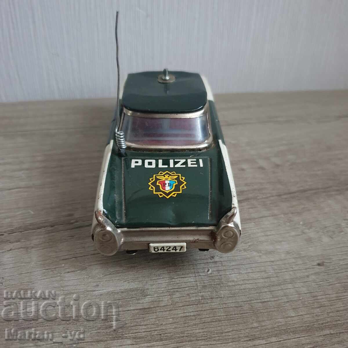 Delivery of Old tin toy car Ichiko Japan 1960