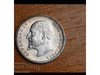 From a penny. Silver coin