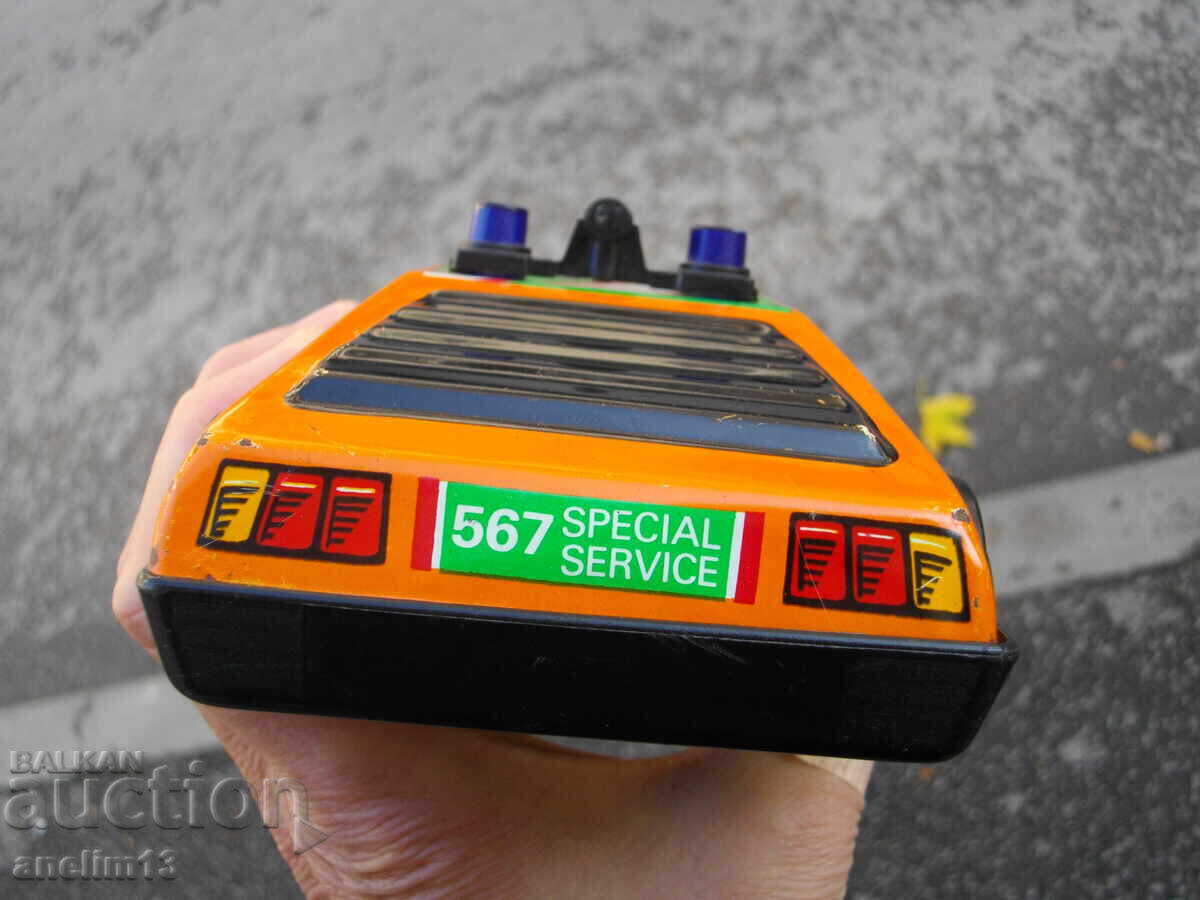 Delivery of OLD TIN TOY CAR SPECIAL SERVICE