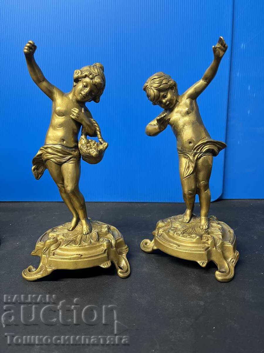 Δύο χάλκινα ειδώλια - αγόρι και κορίτσι