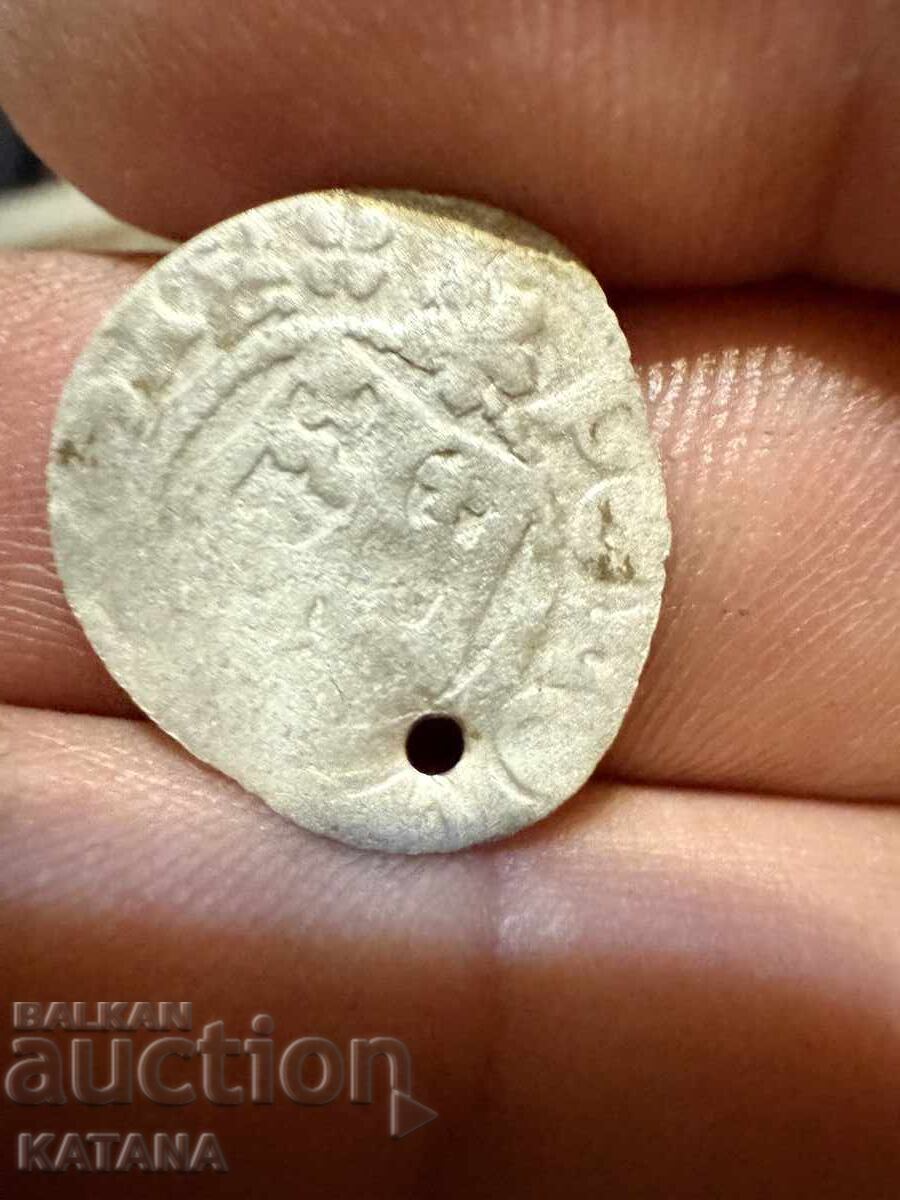 Licitație O monedă de argint