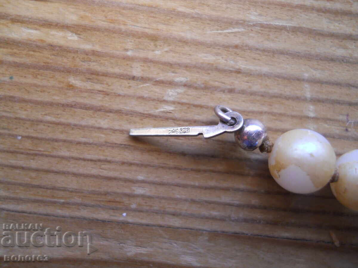 Pearl necklace with a silver clasp with price 24.00 BGN | € 12.27 Pearl necklace with a silver clasp with price 24.00 BGN | € 12.27