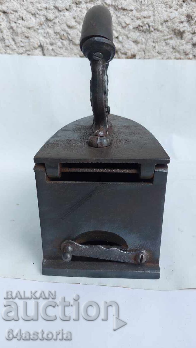Delivery of Flat iron heated by charcoal, coal, or embers, antique flat iron