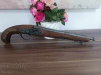 Exceptionally good replica of an old flintlock pistol. Has