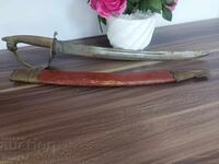 Old Indian saber with scabbard