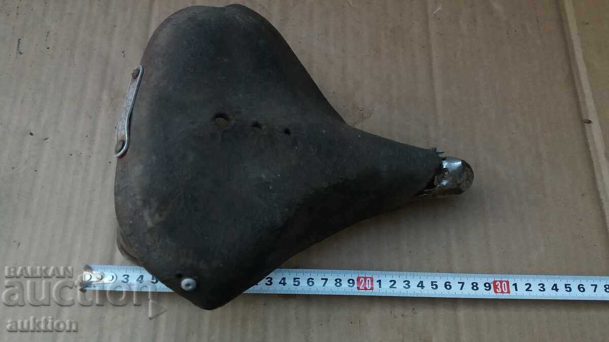 Auction OLD SOCIALIST BIKE SEAT, WHEEL Auction OLD SOCIALIST BIKE SEAT, WHEEL