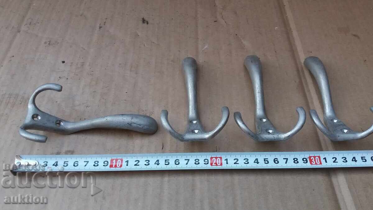Auction Set of 4 Solid Bronze Coat Hooks Auction Set of 4 Solid Bronze Coat Hooks