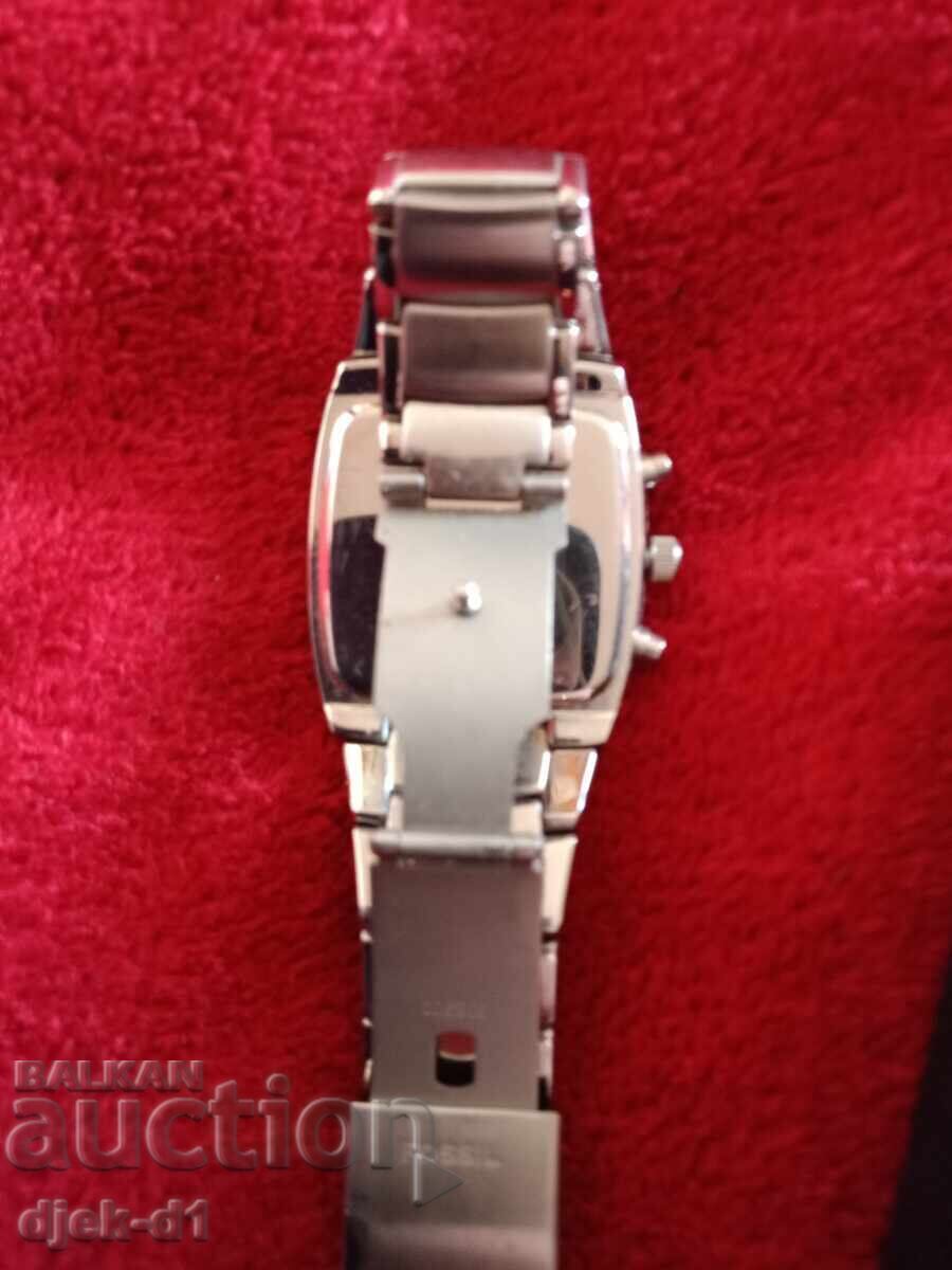 Licitație "FOSSIL-ARKITEKT"-cronograf, masiv