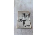 Photo Varna Boy with belt and sombrero on the beach 1962