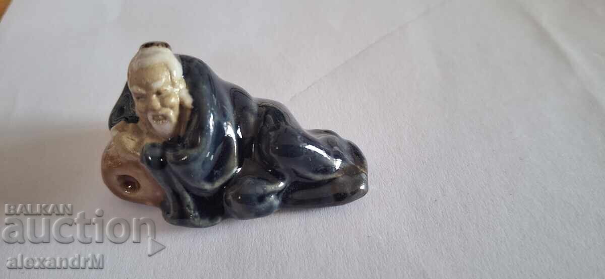 Chinese ceramic figurine, "mudman" type