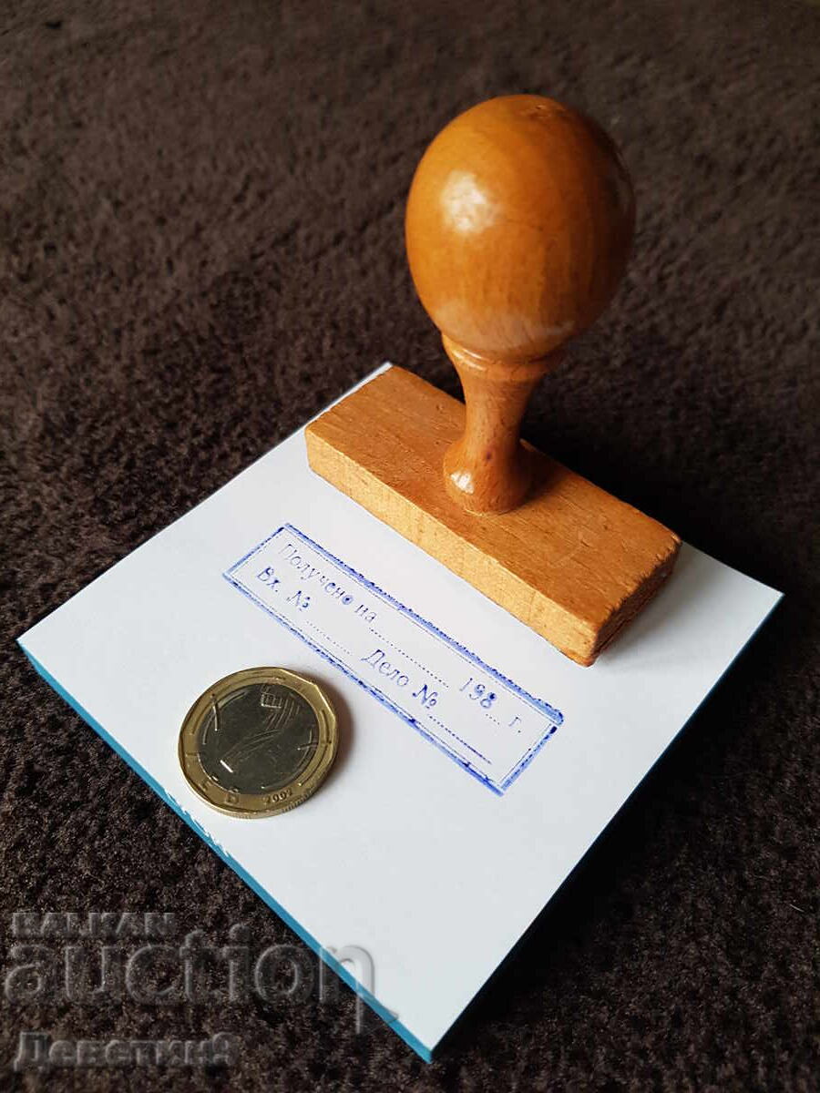 Auction  Old wet stamp with a wooden handle