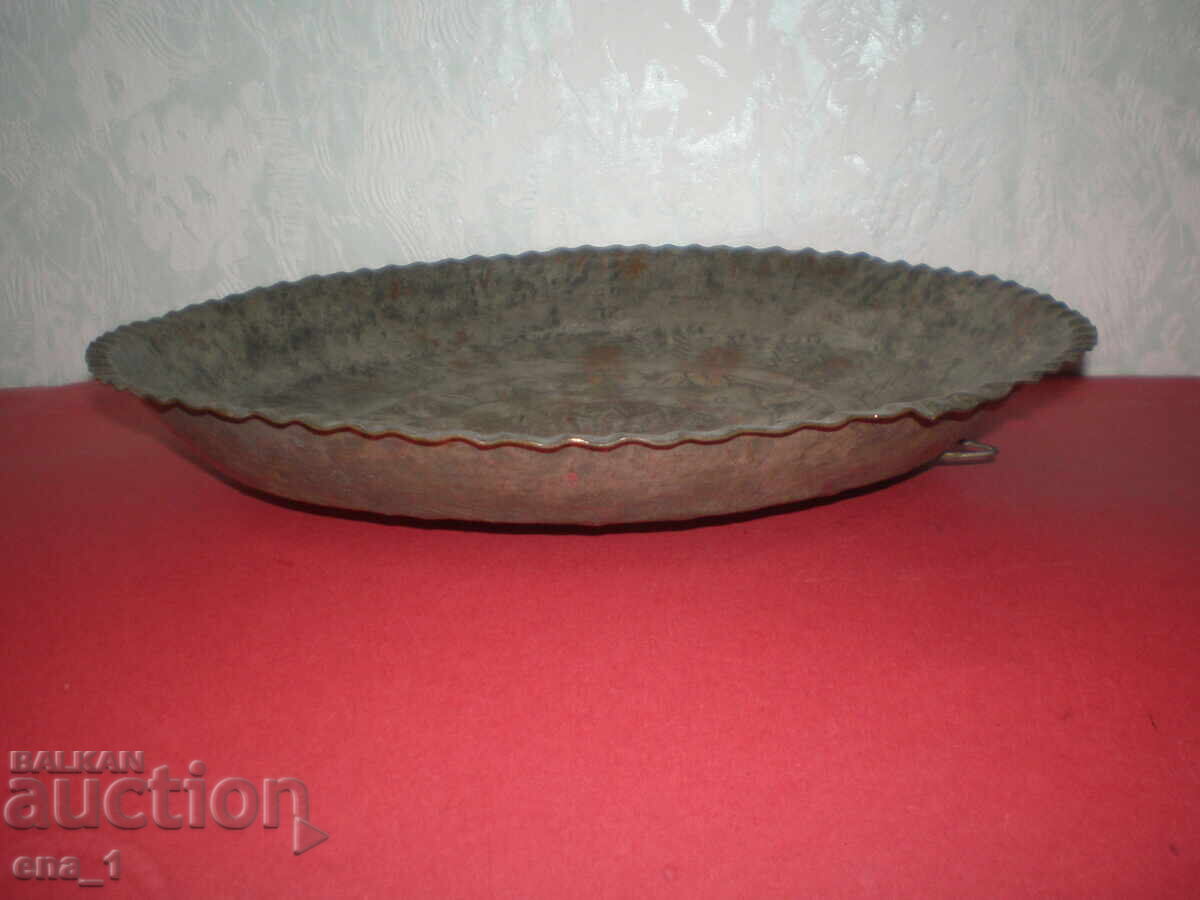 Auction 19th-century Revival copper-tinned platter with ornaments Auction 19th-century Revival copper-tinned platter with ornaments