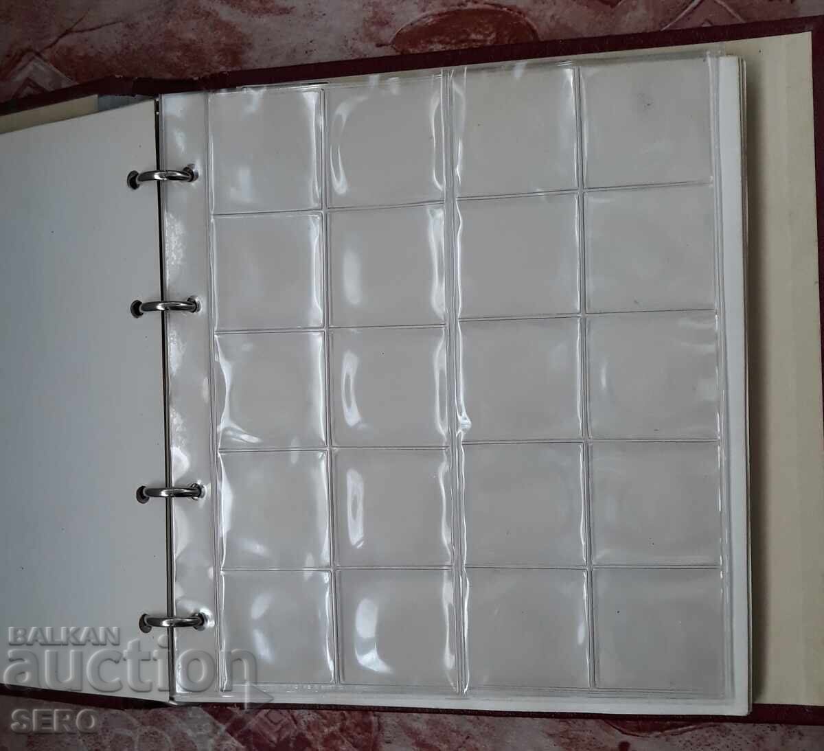 Delivery of Coin album with 10 sheets for 176 coins of different sizes
