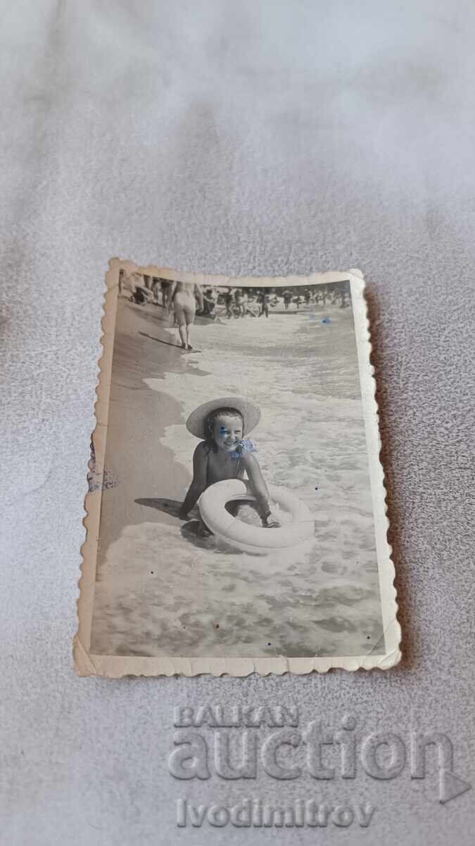 Photo of a little girl on the seashore