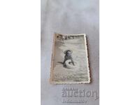 Photo of a little girl on the seashore