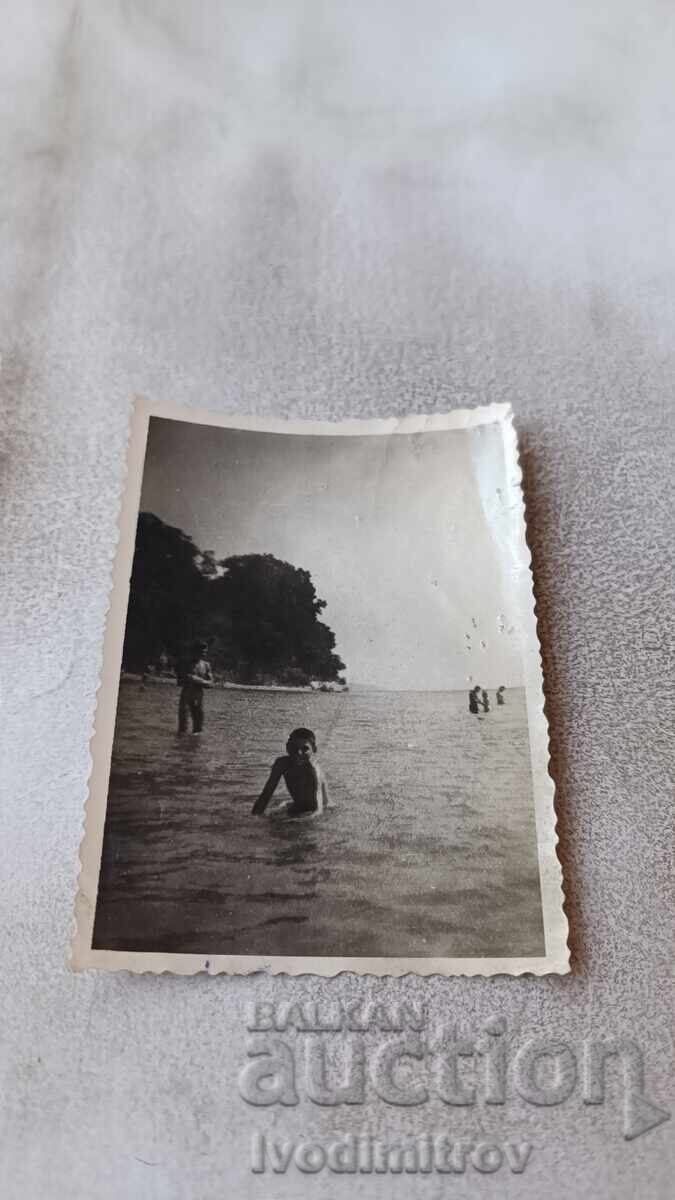 Photo of a Boy in the Sea