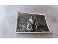 Picture of a Man and a Little Girl in the Sea