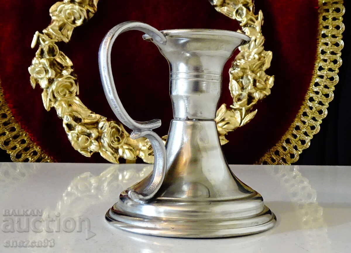 Калаен свещник с дръжка 9 см. с цена 14.00 лв. | € 7.16 Калаен свещник с дръжка 9 см. с цена 14.00 лв. | € 7.16