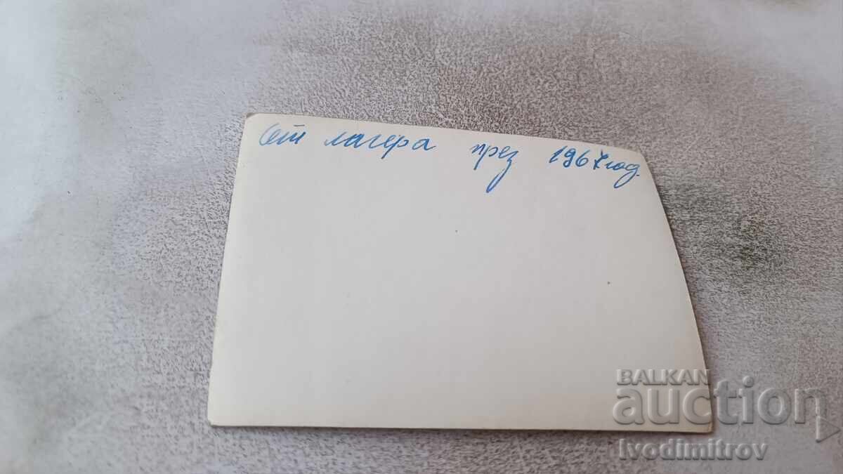 Photograph of Young Men and Women on a Cliff Overlooking the Sea, 1967 with price 1.65 BGN | € 0.84