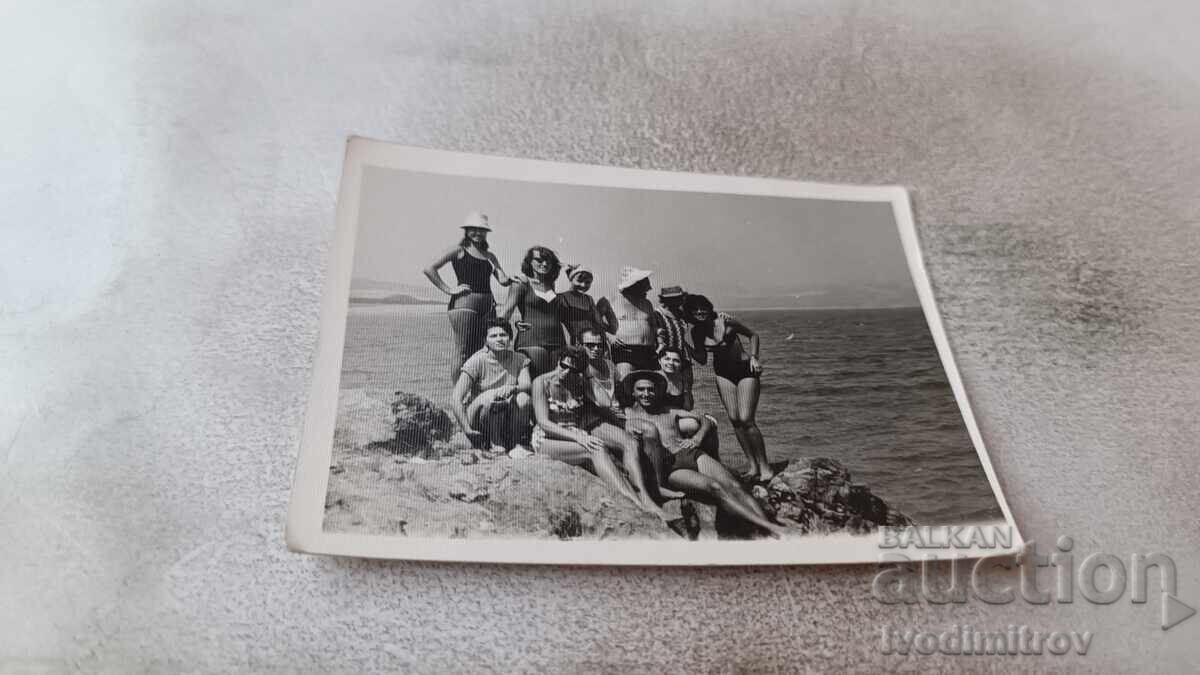 Photograph of Young Men and Women on a Cliff Overlooking the Sea, 1967