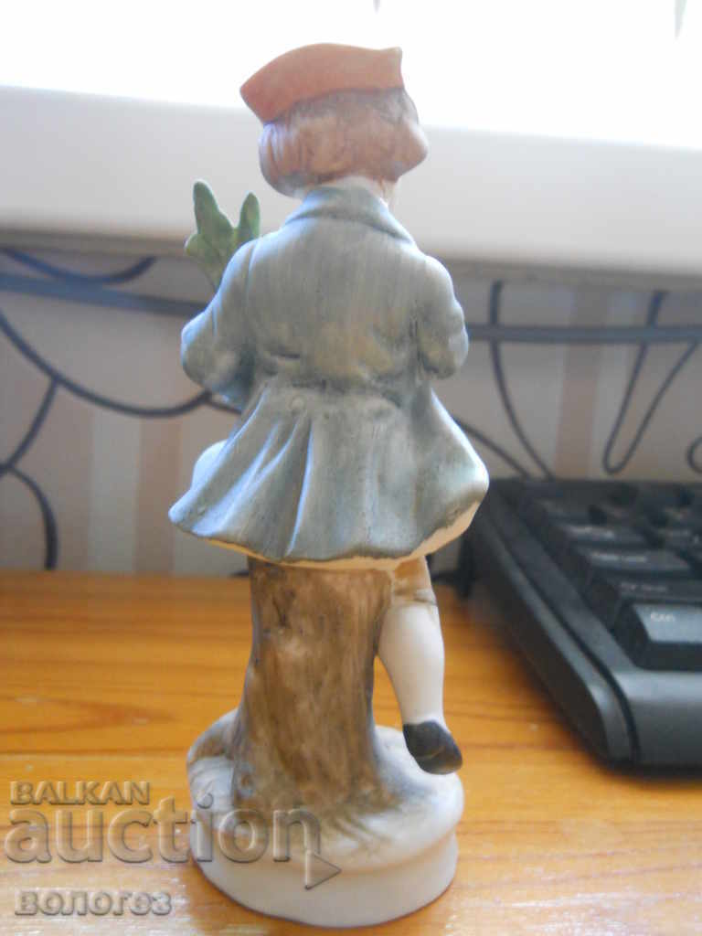 Auction  Boy with flowers - biscuit porcelain